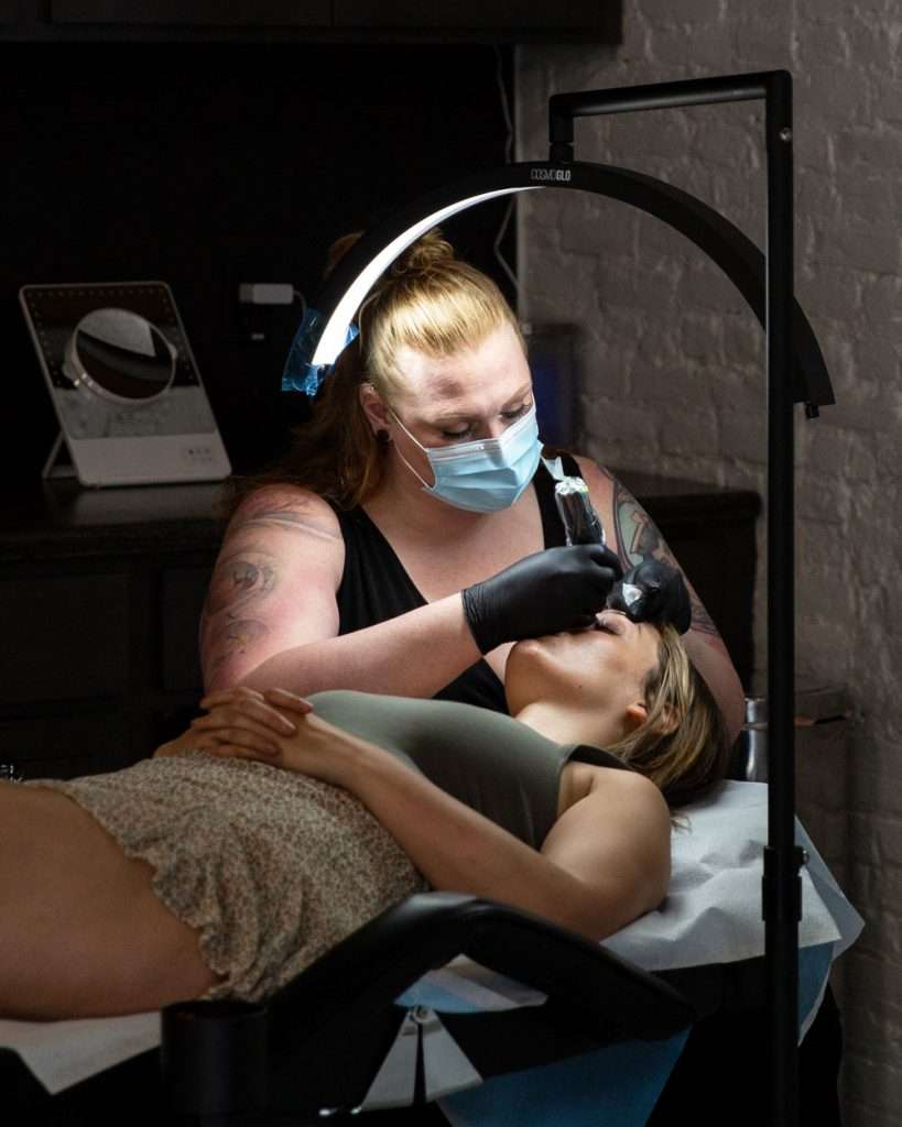 Autumn performing permanent makeup application at Painted Lady Studios in Syracuse NY.